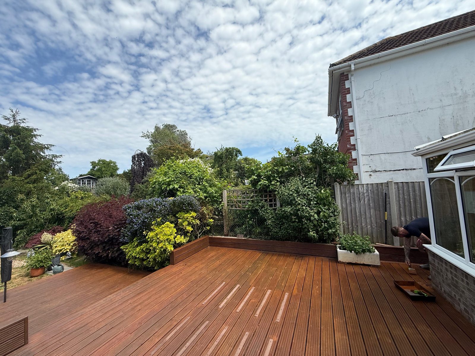 The same decking cleaned and treated back to like new