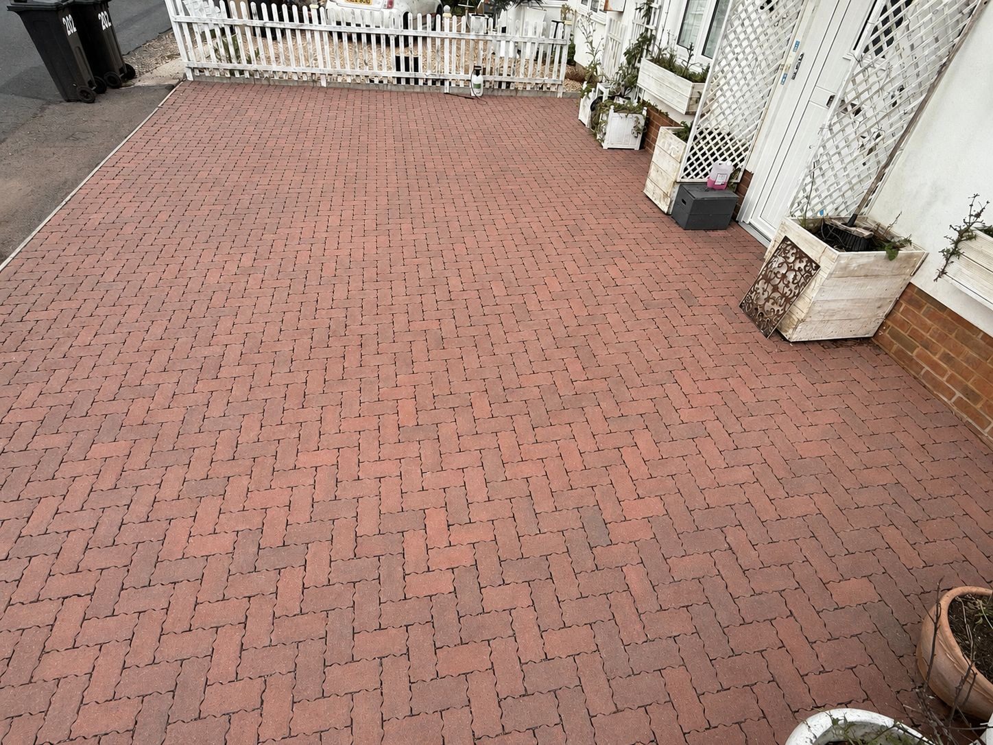 The same block-paving driveway after cleaning and re-sanding